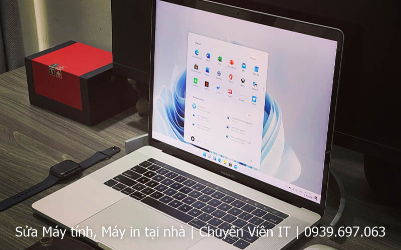 Cai Macbook quan Tan Bình.